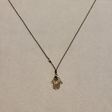 14k Hamsa Necklace with Small Sapphire Charm