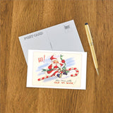 St. Nick Riding Candy Cane Postcard