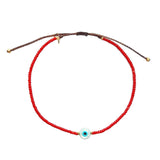 Handmade Beaded Bracelet with Round Eye Charm Accent
